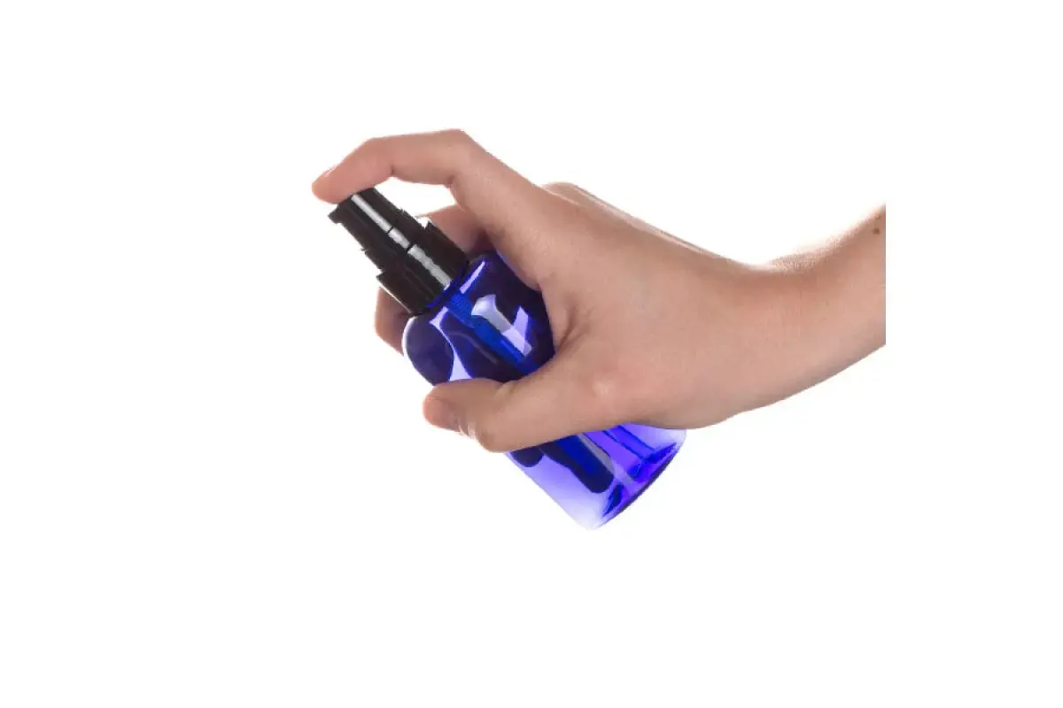 2 oz. Blue Plastic Oval Bottle with Black Treatment Pump