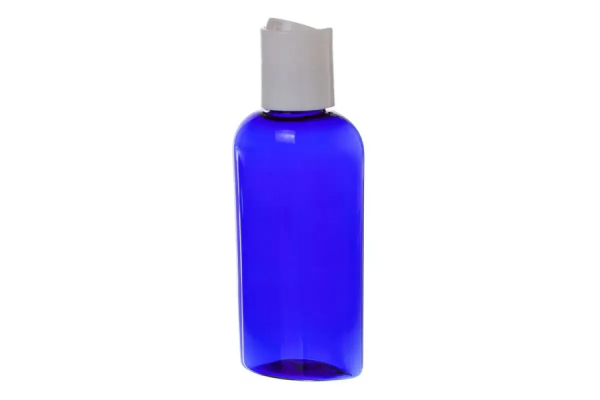 2 oz. Blue Plastic Oval Bottle with White Disc-top Cap